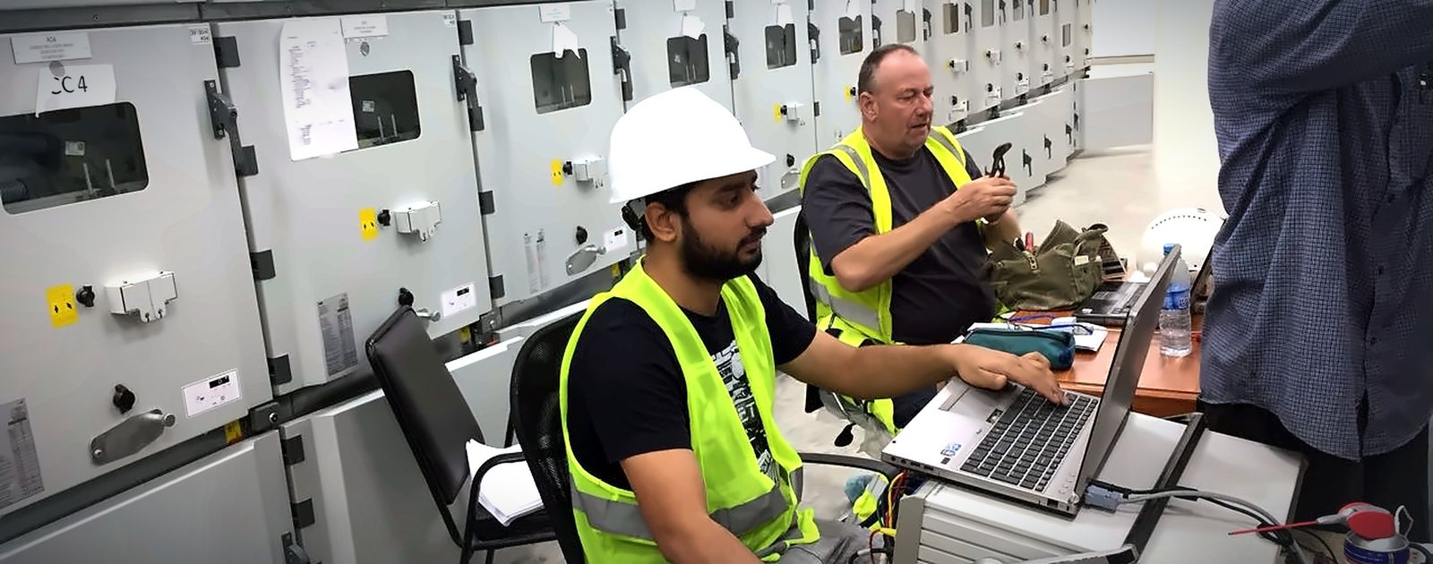Lineman engineers testing and commissioning medium voltage switchgear at DG Cement Hub plant